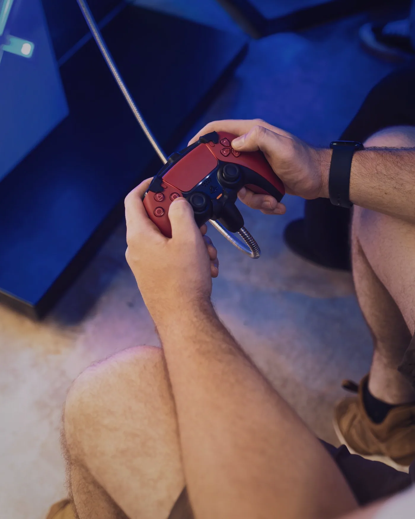 A member leaning towards a monitor during a strategy game